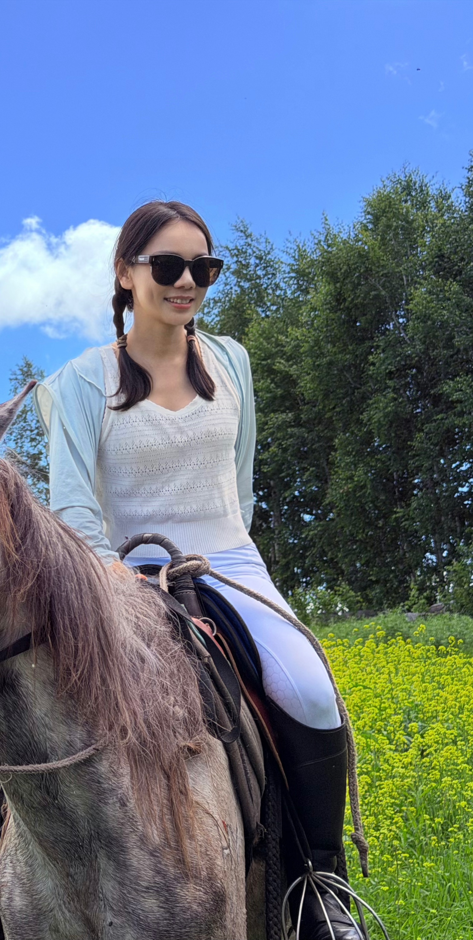 Lumi riding through summer fields
