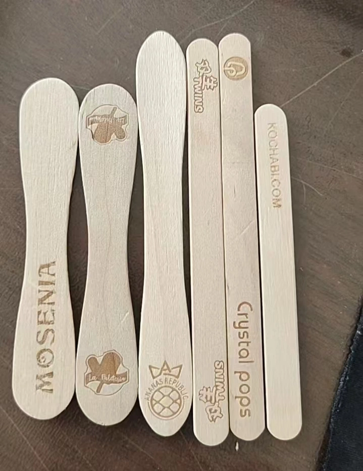 Custom branded ice cream sticks with client logos