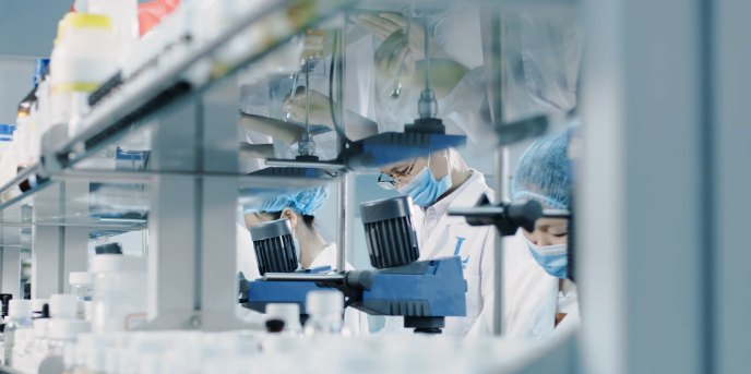 Laboratory staff working on formulation testing