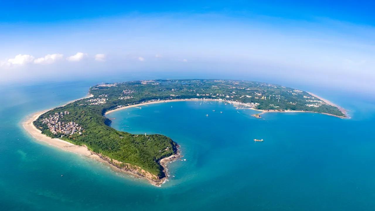 Aerial view of Weizhou volcanic island and its blue bay