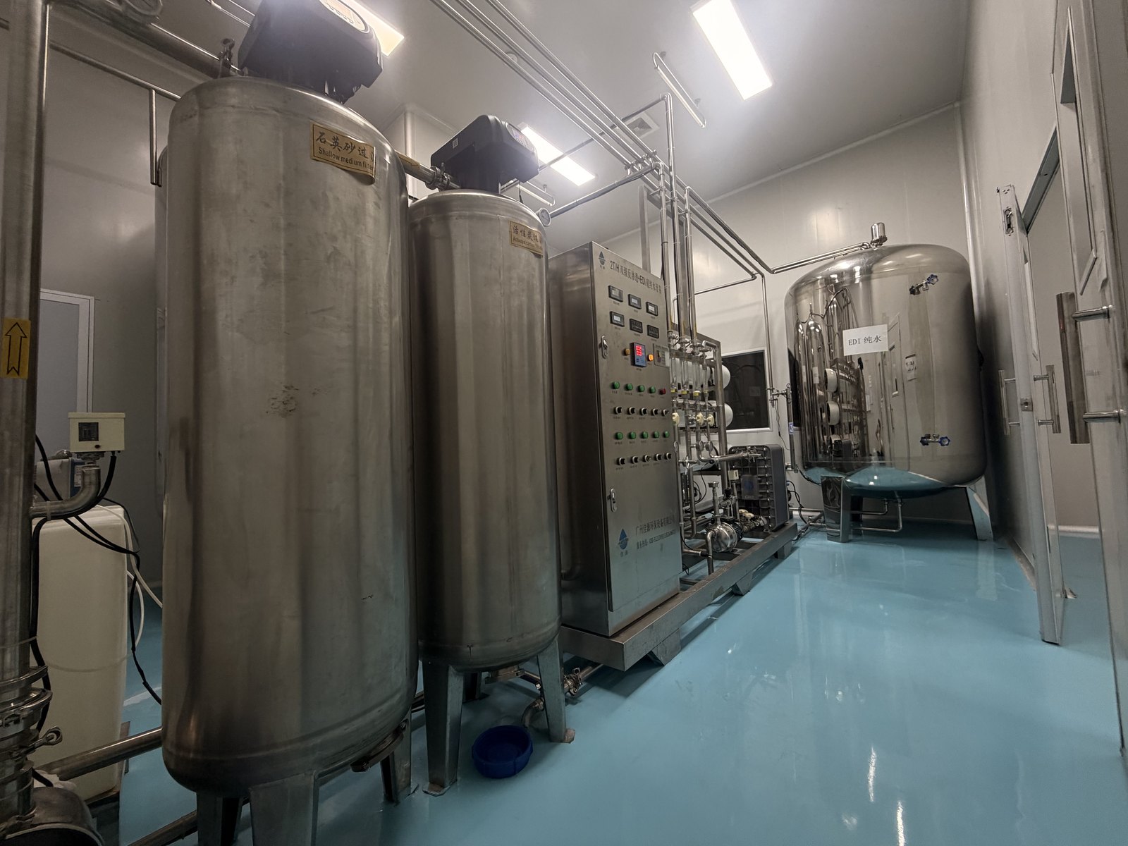 Stainless filter tanks and control cabinet in the clean water room