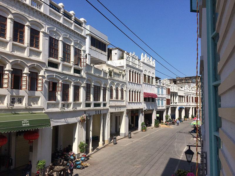 White arcade façades along Qilou Old Street in afternoon light