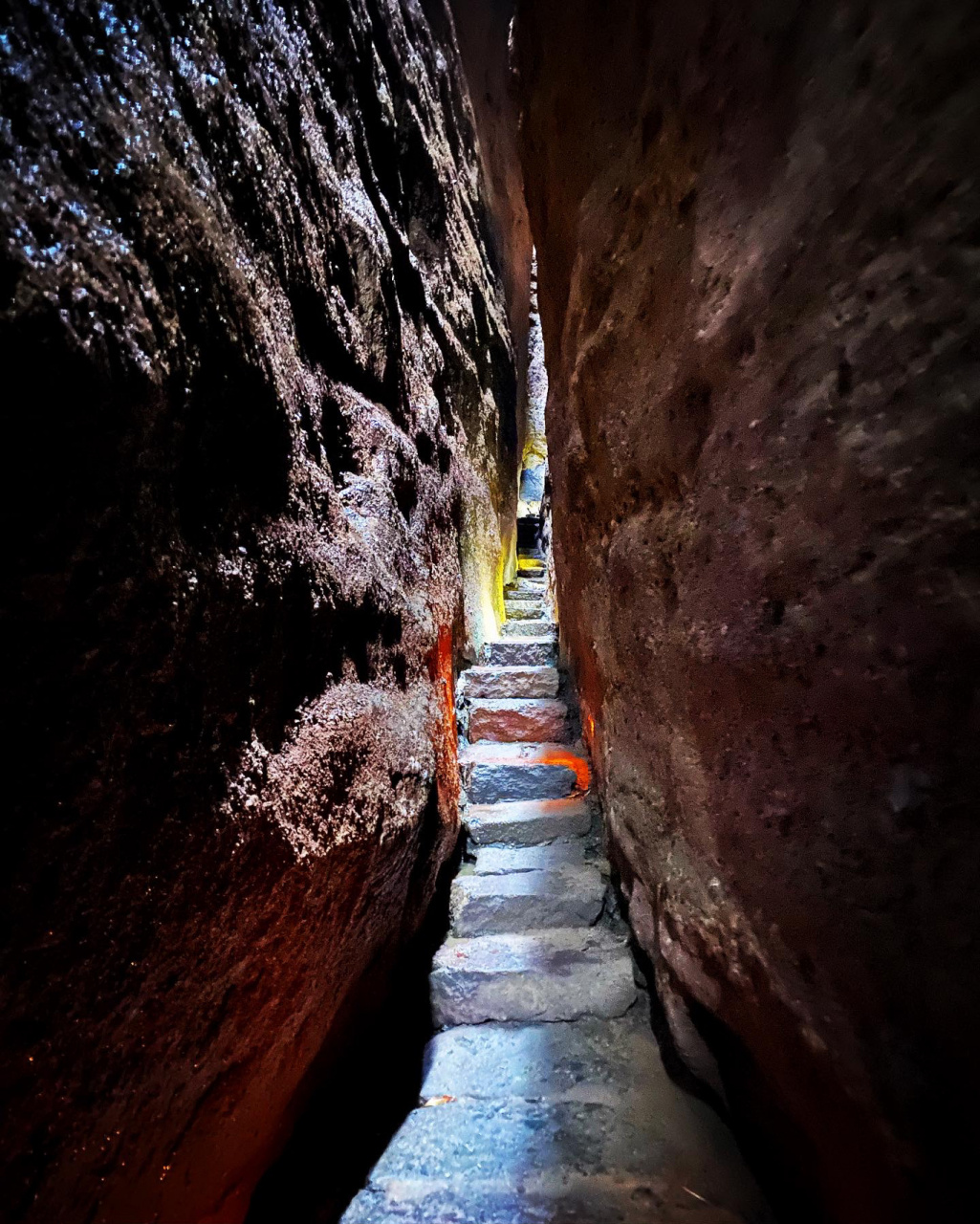 Stone steps threading the narrow crack of a Thread of Sky