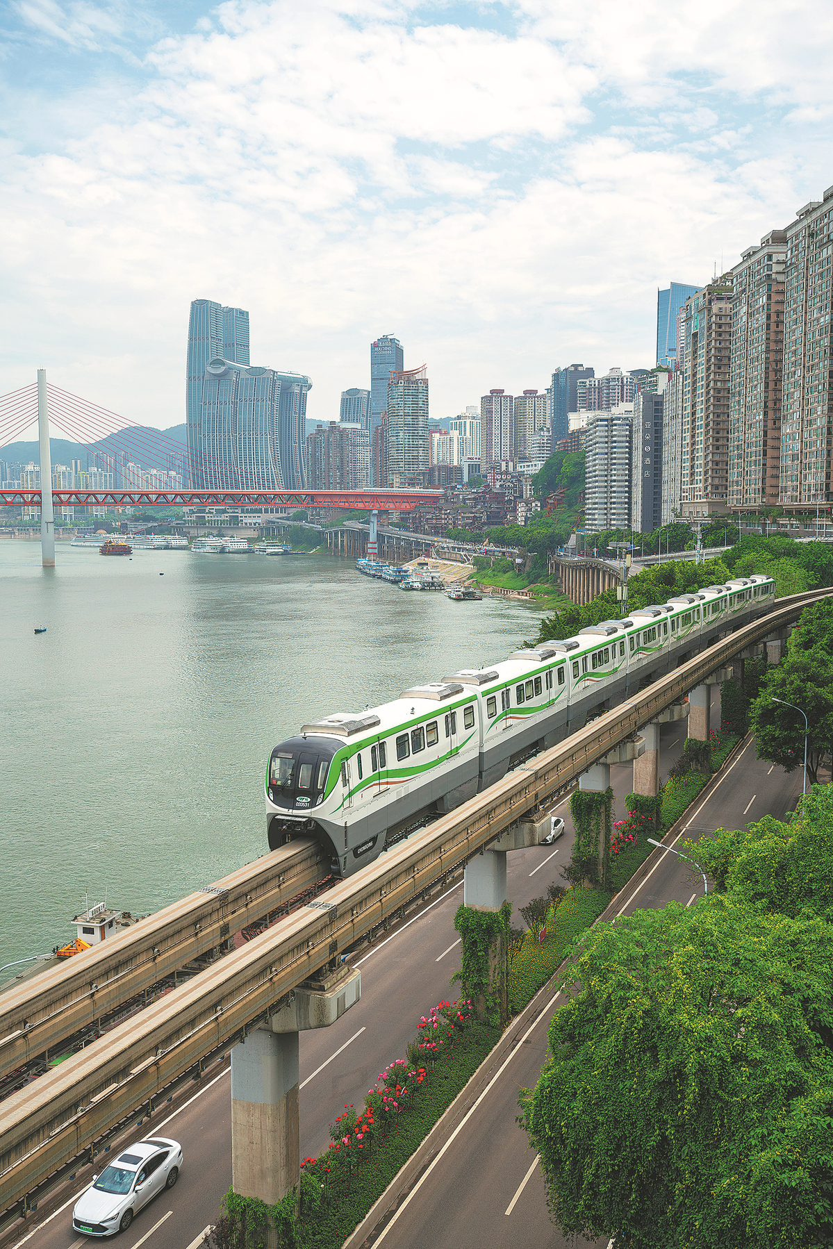 Monorail gliding over the Jialing river in Chongqing