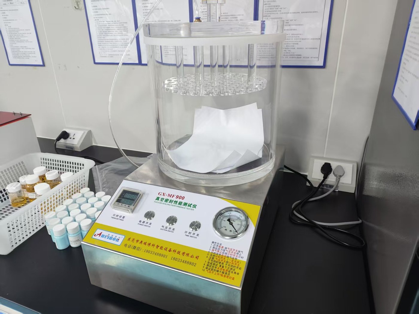 Vacuum seal performance tester in the quality control room