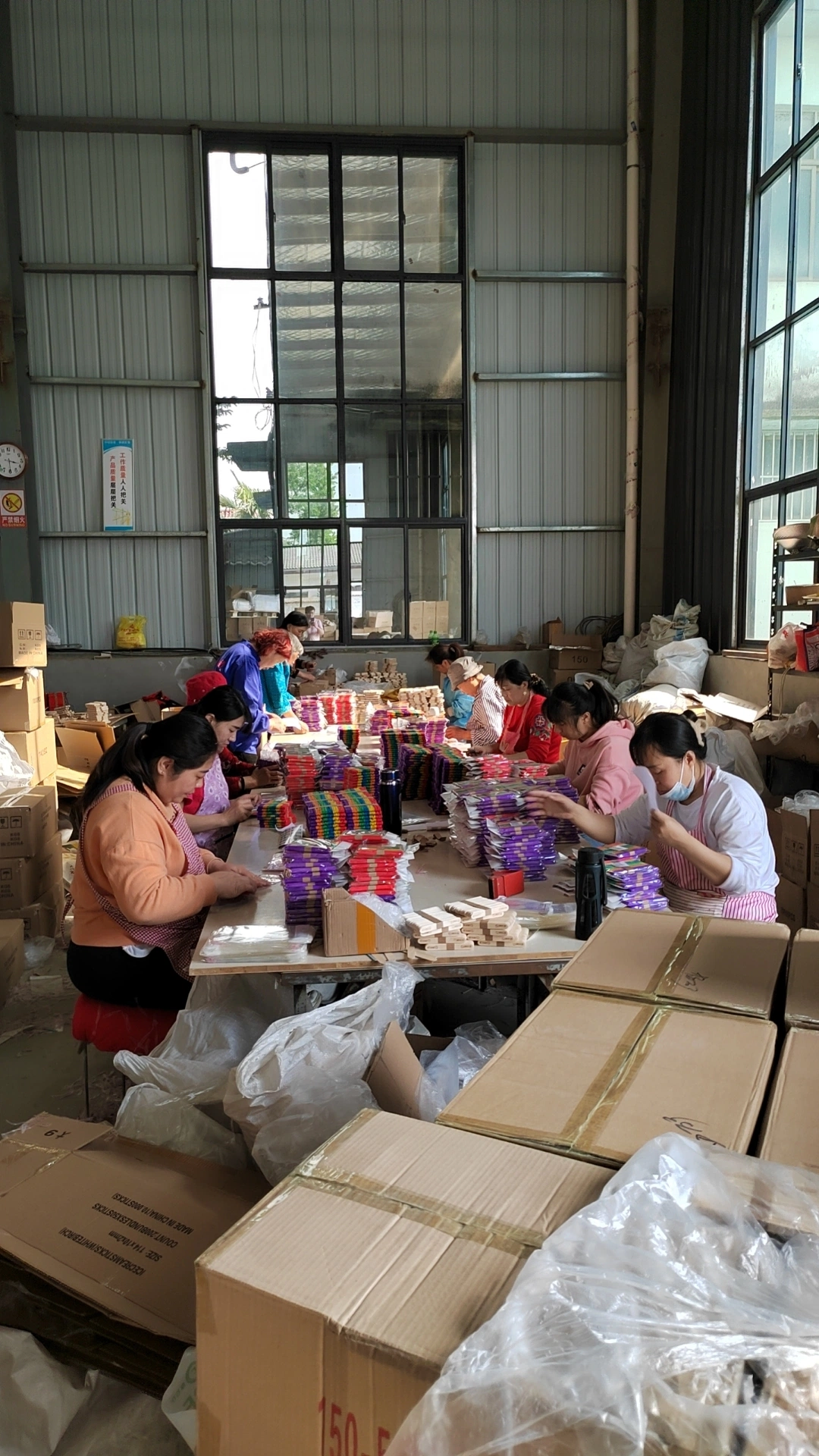 Packing workshop inside our factory — cartons marked MADE IN CHINA, 200 bags per set, white birch ice cream sticks