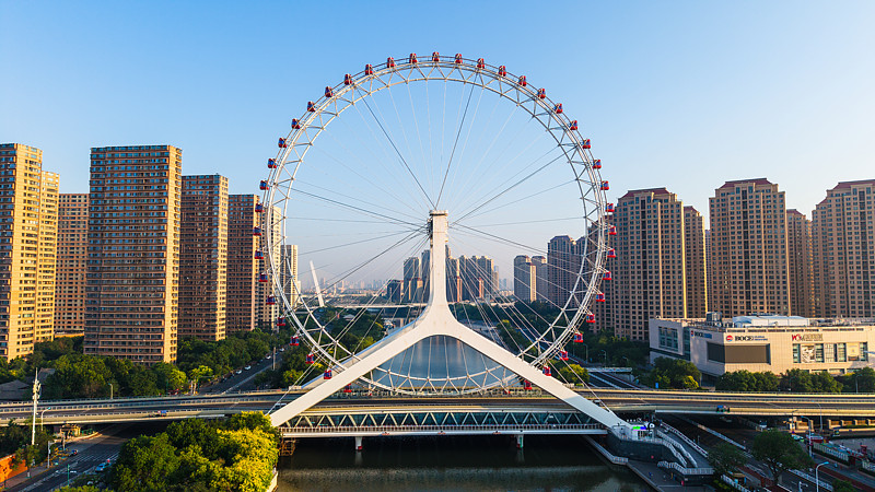 The Tianjin Eye Ferris wheel over the Haihe River